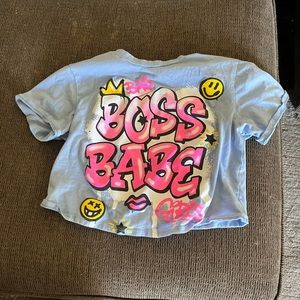 A baby blue crop top in good condition